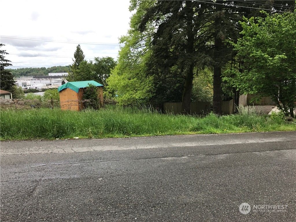 Photo of 10460 22nd Place S, Seattle, WA 98168 (MLS # 2199647)
