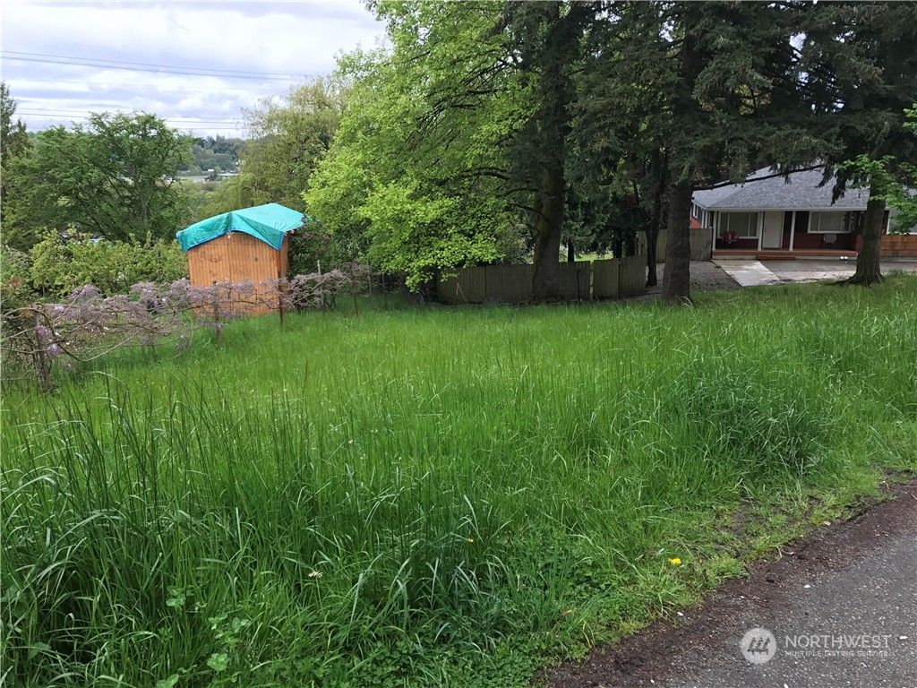 Photo of 10460 22nd Place S, Seattle, WA 98168 (MLS # 2199647)