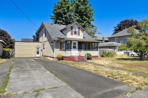Photo of 709 W Pioneer, Puyallup, WA 98371 (MLS # 2409023) Photo of 709 W Pioneer, Puyallup, WA 98371 (MLS # 2409023)