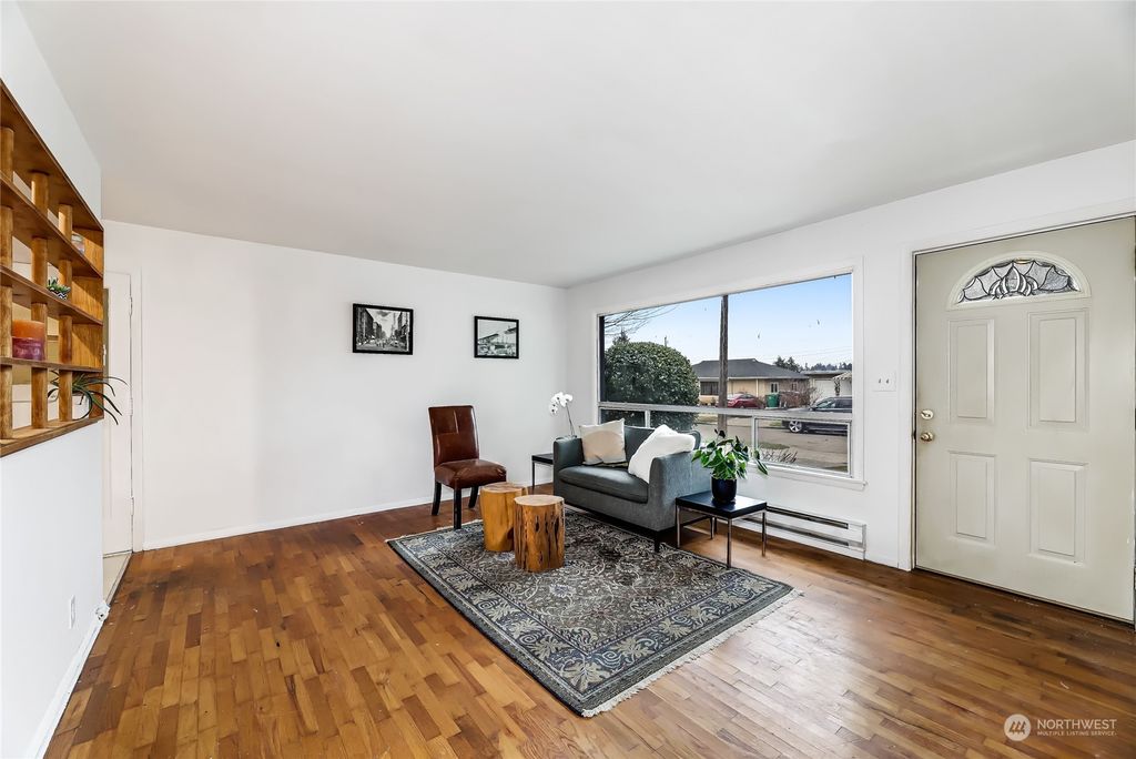 Photo of 9355 31st Place SW, Seattle, WA 98126 (MLS # 2031126)