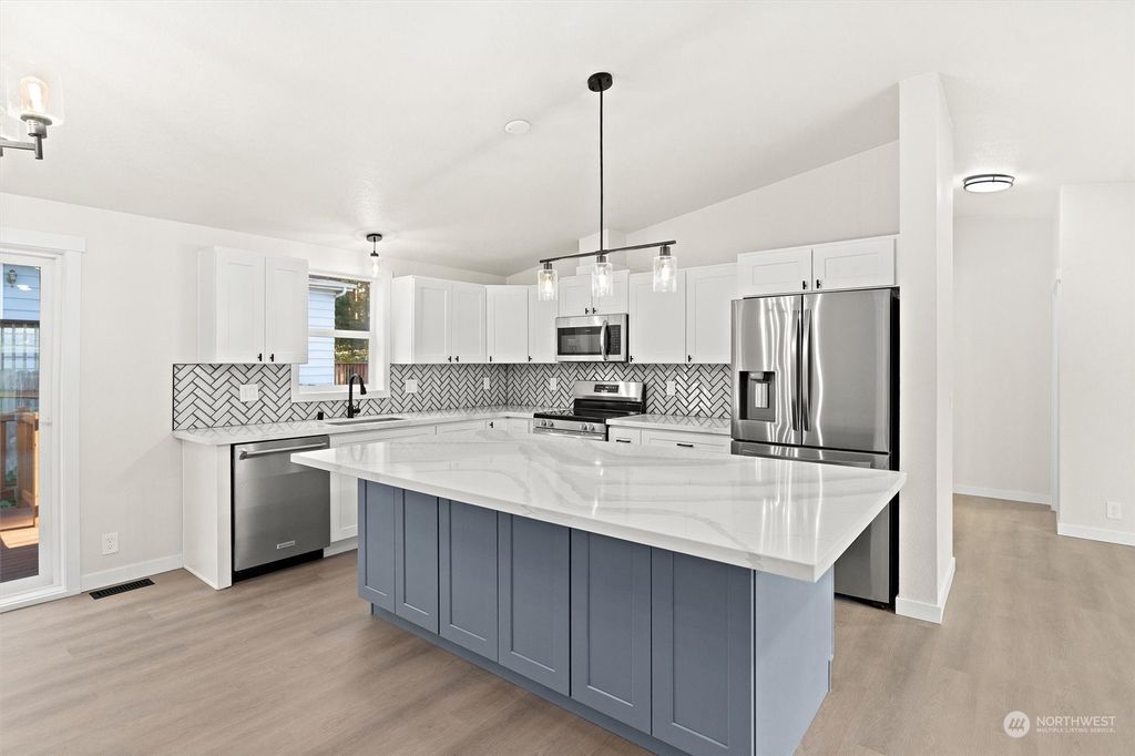 Photo of 9304 13th Place SE, Lake Stevens, WA 98258 (MLS # 2313921)