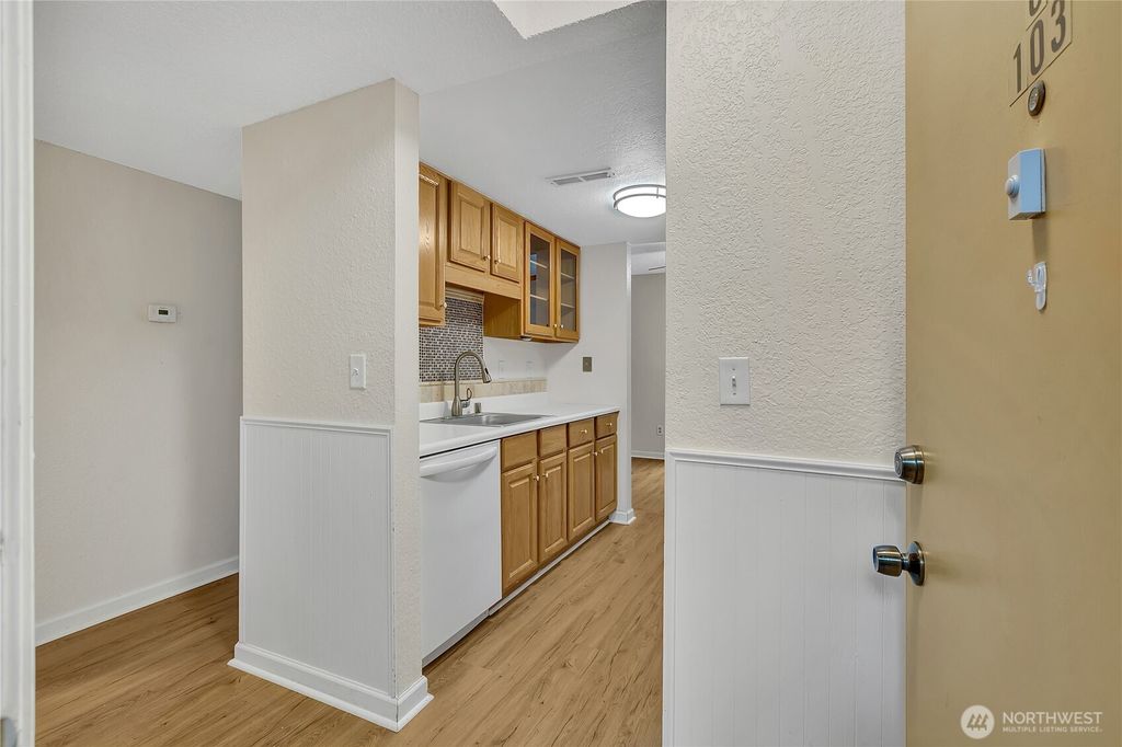 Photo of 10125 SE 235th Place #C103, Kent, WA 98031 (MLS # 2348773)