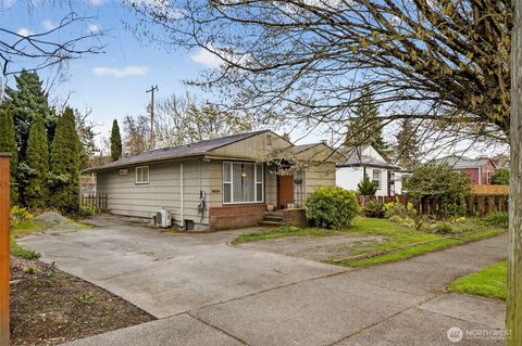 Photo of 8620 35th Avenue SW, Seattle, WA 98126 (MLS # 2499158)