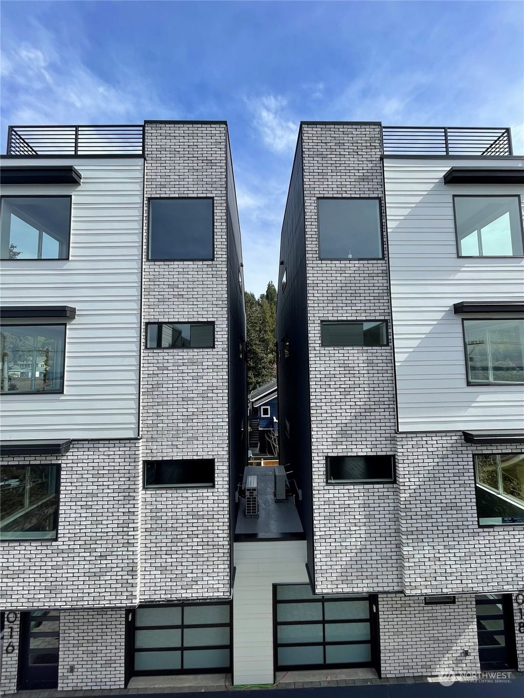 Photo of 4016 Beach Drive SW, Seattle, WA 98116 (MLS # 2050739)