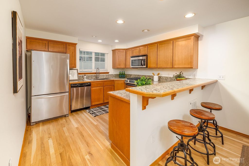 Photo of 12333 28th Avenue NE #A, Seattle, WA 98125 (MLS # 2506076)