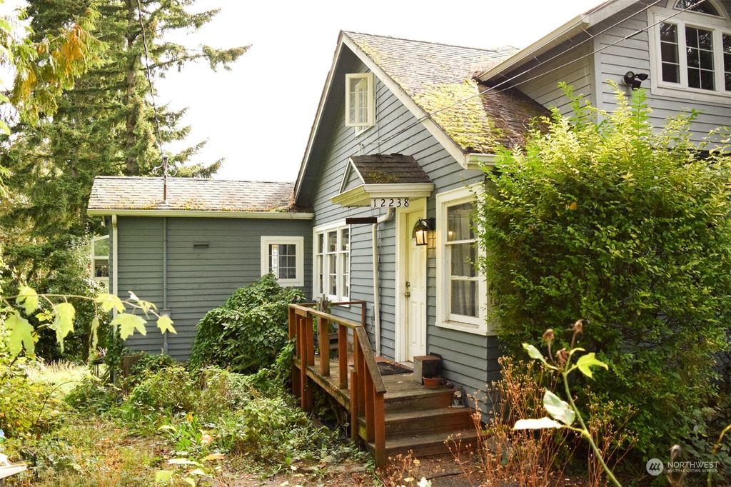 Photo of 12238 Military Road S, Seattle, WA 98168 (MLS # 2296708)