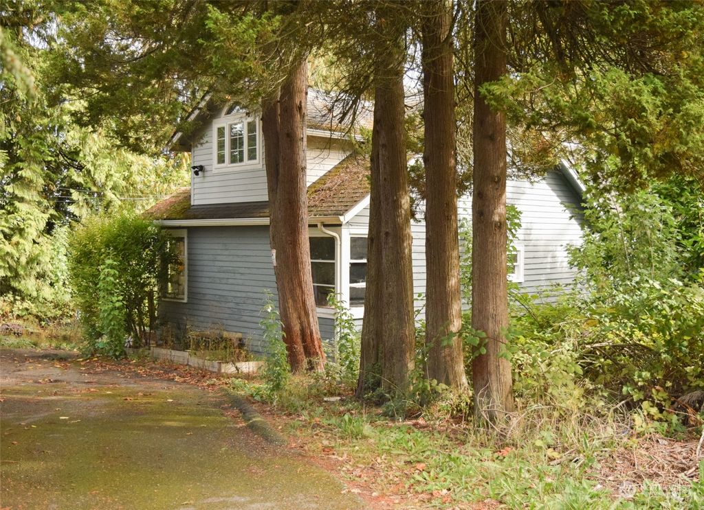 Photo of 12238 Military Road S, Seattle, WA 98168 (MLS # 2296708)
