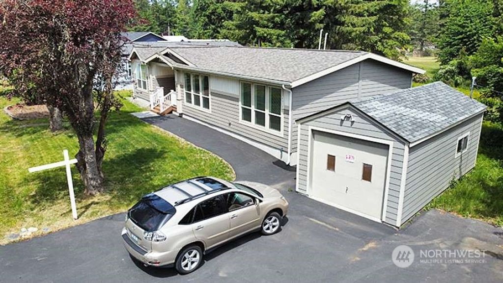 Photo of 9919 215th Place SE, Snohomish, WA 98296 (MLS # 2125692)