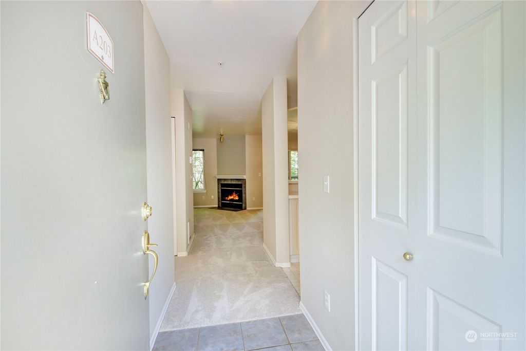 Photo of 18505 SE Newport Way #A203, Issaquah, WA 98027 (MLS # 2070526)