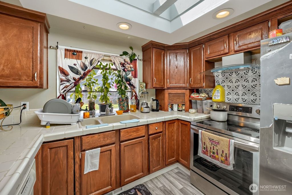 Photo of 23205 125th Avenue SE, Kent, WA 98031 (MLS # 2528288)