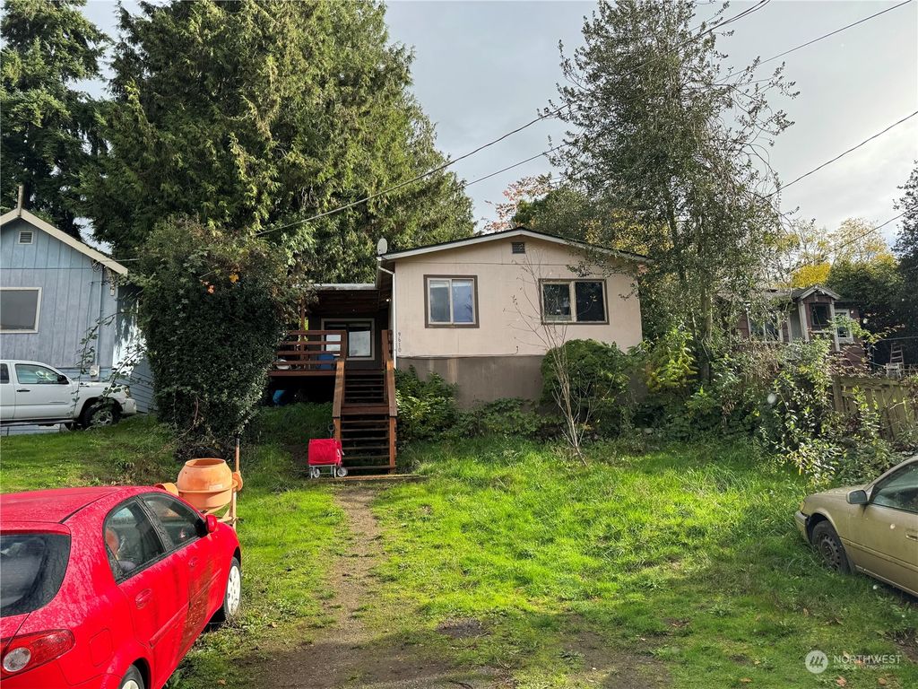 Photo of 9610 11th Avenue SW, Seattle, WA 98106 (MLS # 2251311)