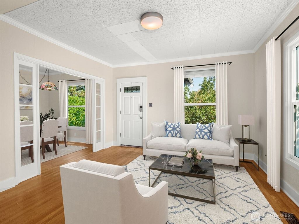 Photo of 5115 S Mayflower Street, Seattle, WA 98118 (MLS # 2453739)