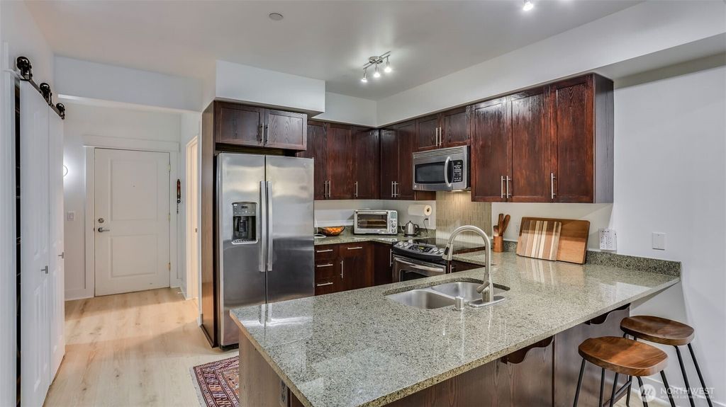Photo of 699 John Street #306, Seattle, WA 98109 (MLS # 2423540)