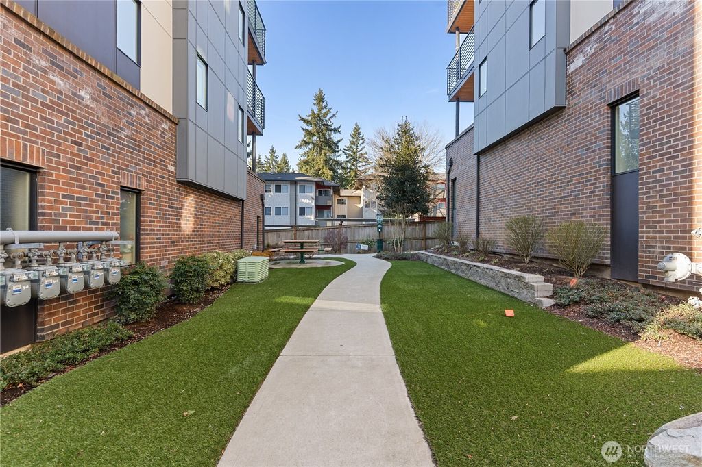 Photo of 15538 NE 15th Place #301, Bellevue, WA 98007 (MLS # 2500016)