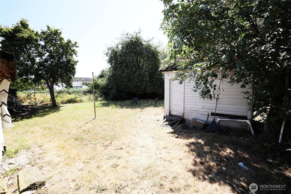 Photo of 6721 38th Avenue S, Seattle, WA 98118 (MLS # 2408588)