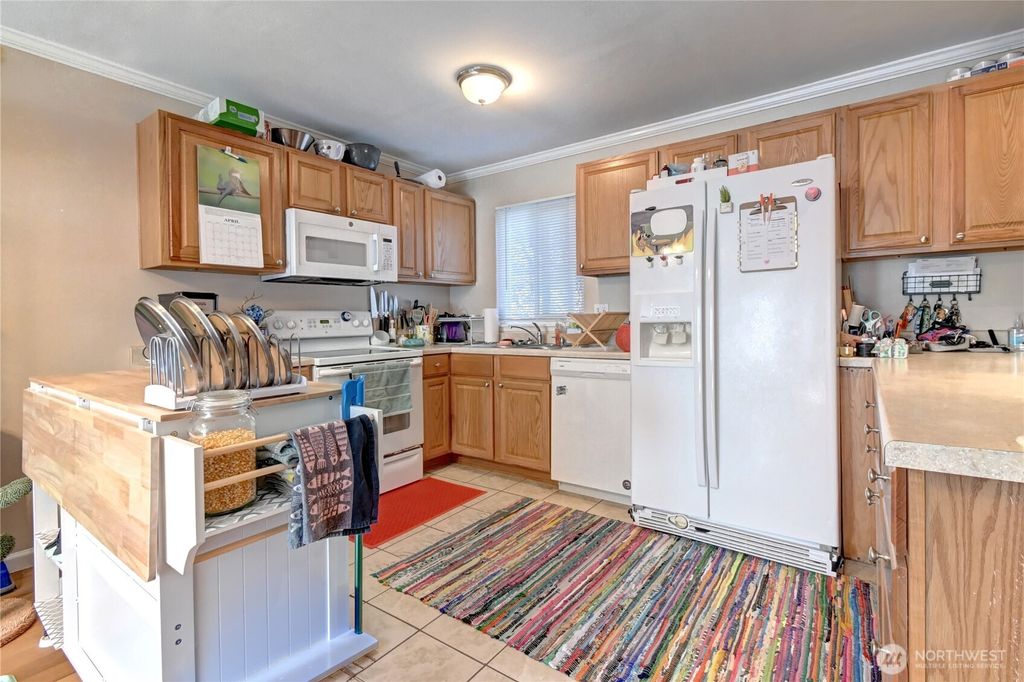 Photo of 8823 Holly Dr Dr #E206, Everett, WA 98208 (MLS # 2504088)