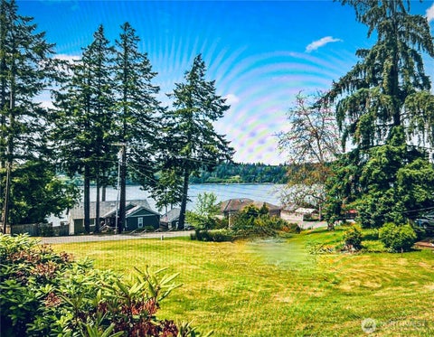 Photo of 10142 Steamboat Island Road NW, Olympia, WA 98502 (MLS # 2549773)