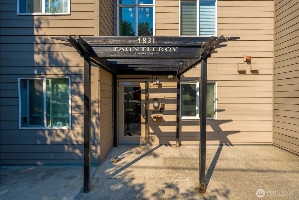Photo of 4831 Fauntleroy Way SW #401, Seattle, WA 98116 (MLS # 2427404)