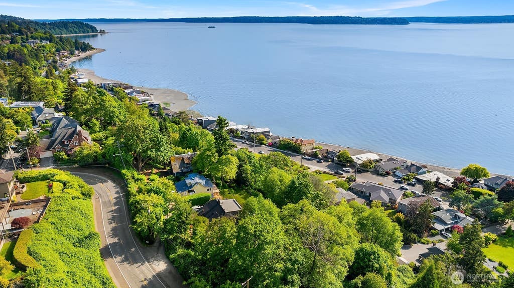 Photo of 5215 SW Jacobsen Road, Seattle, WA 98136 (MLS # 2571408)