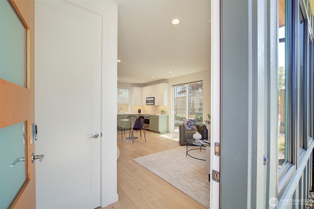 Photo of 8319 25th Avenue NW, Seattle, WA 98117 (MLS # 2575717)