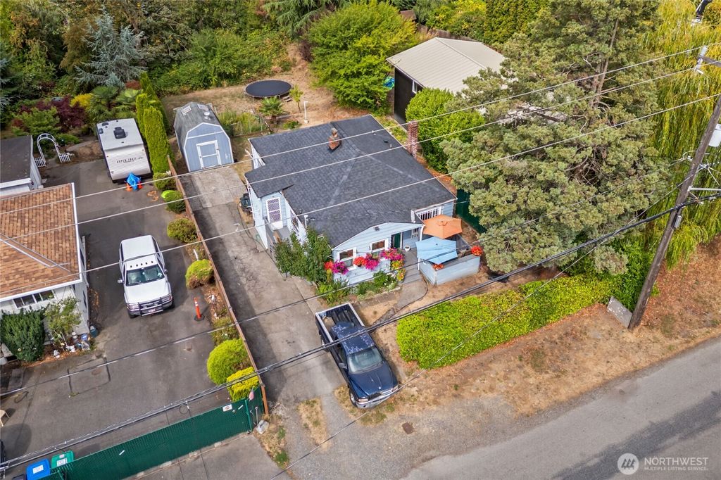 Photo of 5605 21st Avenue SW, Seattle, WA 98106 (MLS # 2422813)