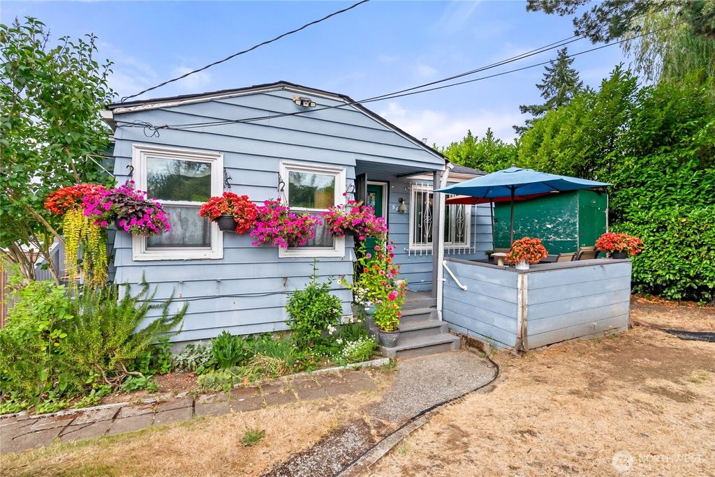 Photo of 5605 21st Avenue SW, Seattle, WA 98106 (MLS # 2422813)