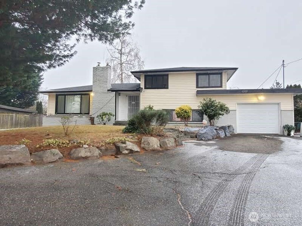 Photo of 12203 16th Avenue S, Seattle, WA 98168 (MLS # 2332399)