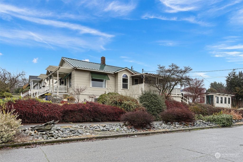 Photo of 4058 36th Ave SW Ave, Seattle, WA 98126 (MLS # 2321433)