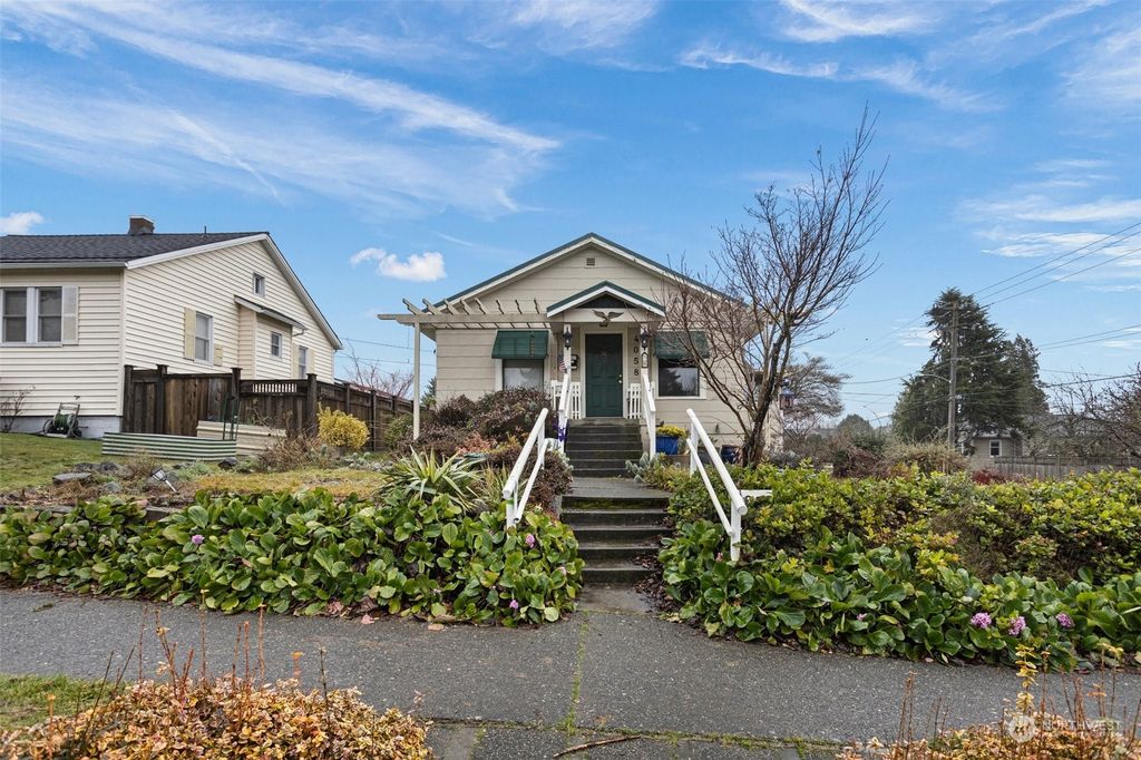 Photo of 4058 36th Ave SW Ave, Seattle, WA 98126 (MLS # 2321433)