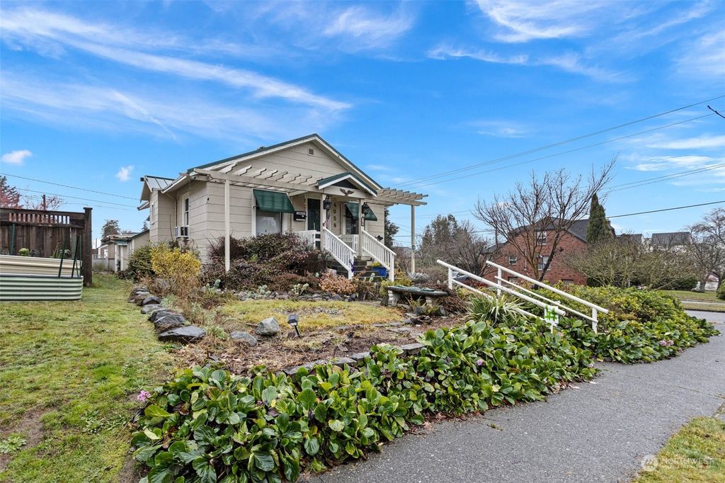 Photo of 4058 36th Ave SW Ave, Seattle, WA 98126 (MLS # 2321433)
