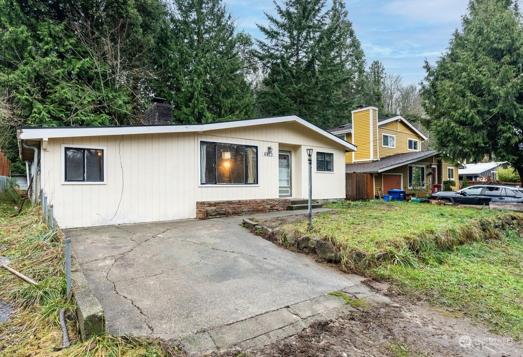 Photo of 6913 25th Avenue SW, Seattle, WA 98106 (MLS # 2319081)