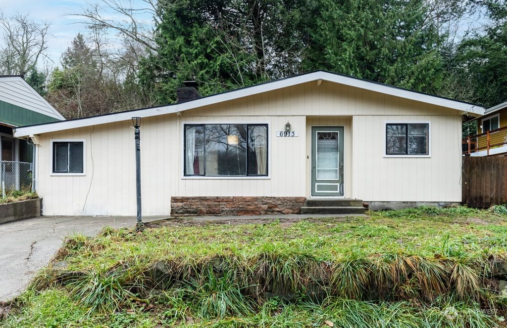 Photo of 6913 25th Avenue SW, Seattle, WA 98106 (MLS # 2319081)