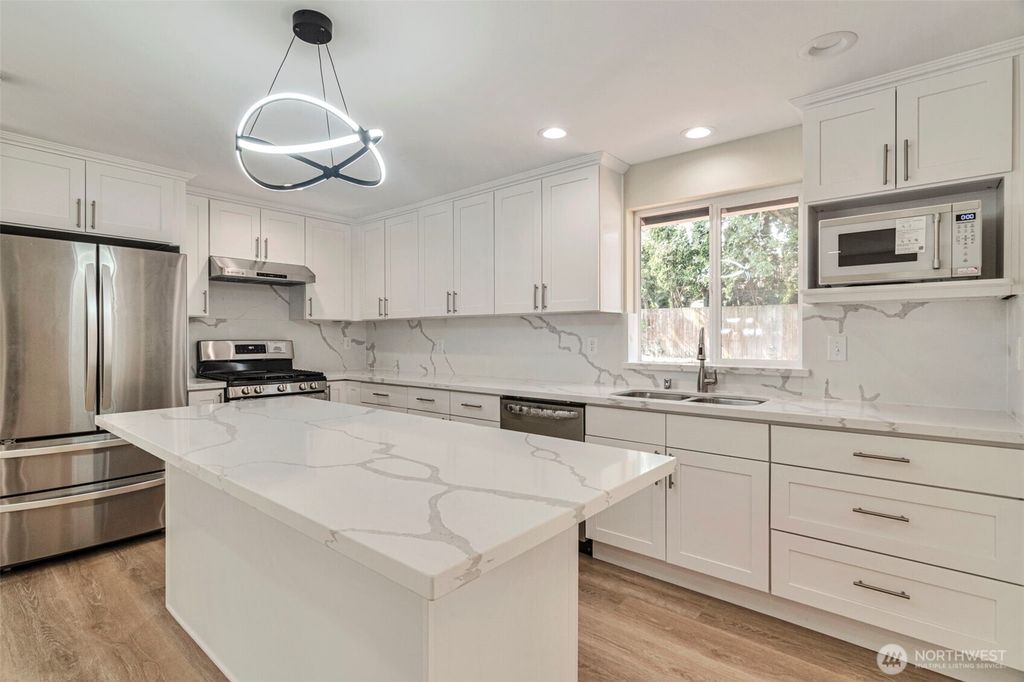 Photo of 21505 124th Avenue SE, Kent, WA 98031 (MLS # 2428039)