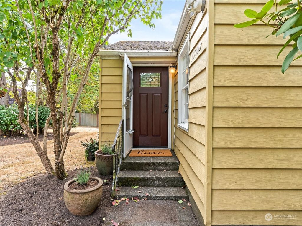Photo of 11705 Sand Point Way NE, Seattle, WA 98125 (MLS # 2157965)