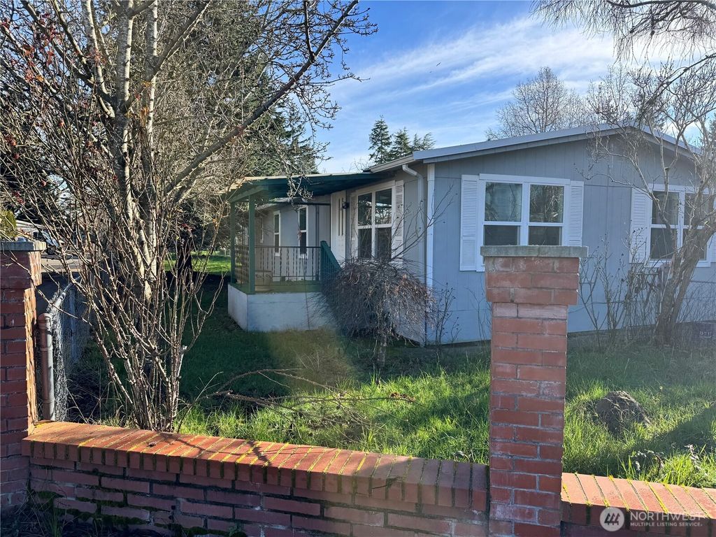 Photo of 11040 14th Avenue SW, Seattle, WA 98146 (MLS # 2469392)