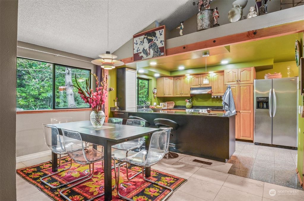 Photo of 11627 28th Avenue SW, Seattle, WA 98146 (MLS # 2075489)