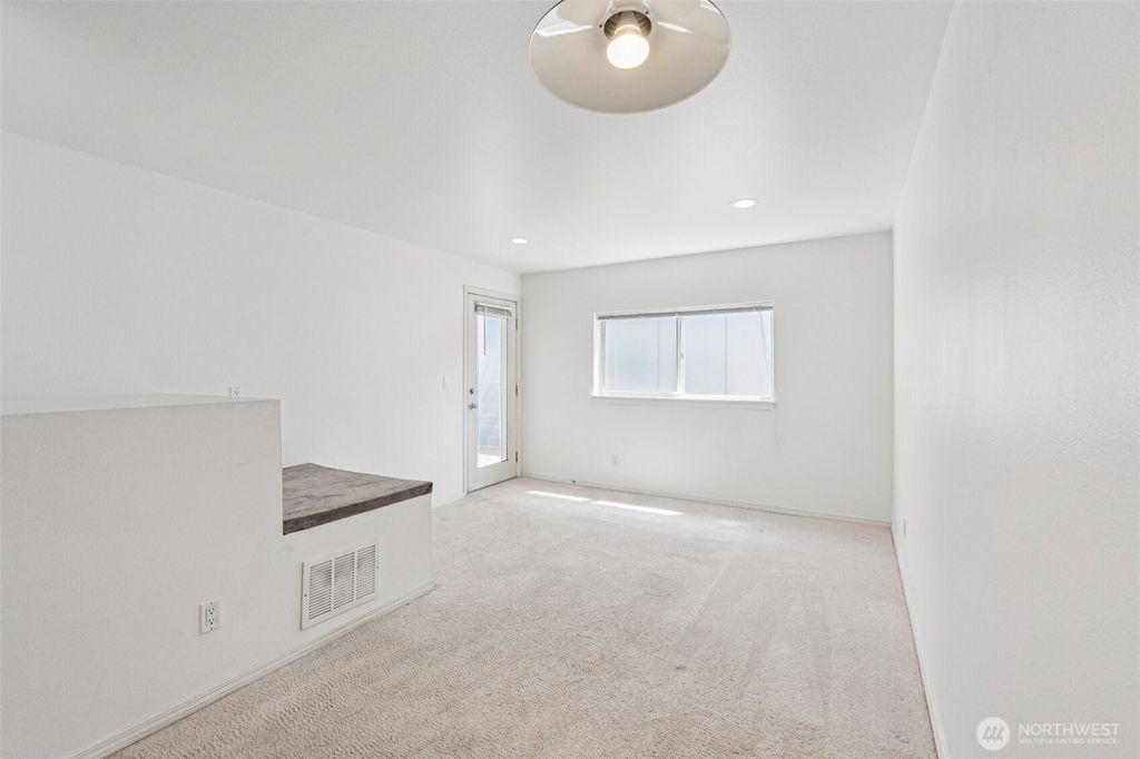 Photo of 5624 Roosevelt Way NE #202, Seattle, WA 98105 (MLS # 2395061)