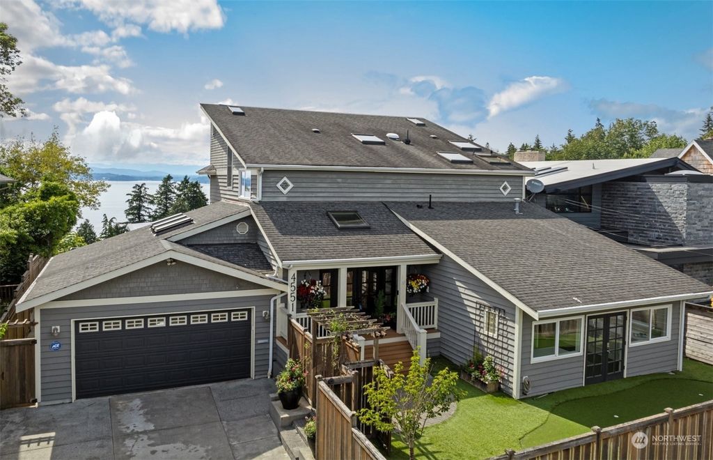 Photo of 4551 51st Place SW, Seattle, WA 98116 (MLS # 2258563)