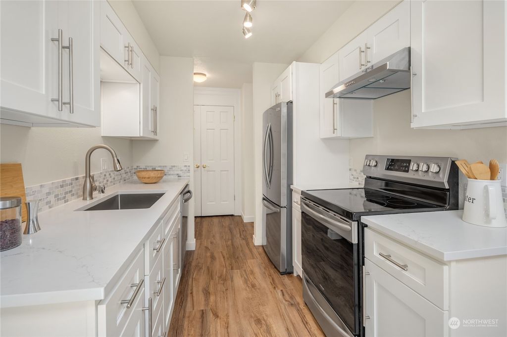 Photo of 12033 15th Avenue NE #302, Seattle, WA 98125 (MLS # 2138046)