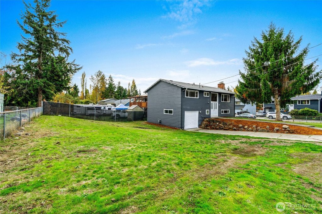 Photo of 12703 SE 163rd St St, Renton, WA 98058 (MLS # 2452385)