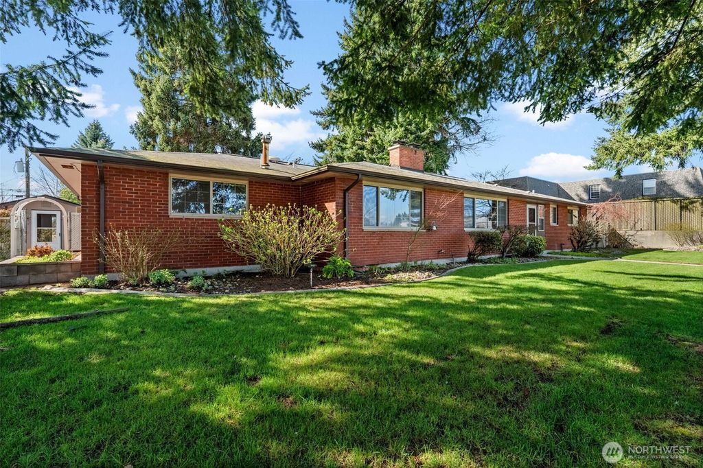 Photo of 1116 S Woodlawn Street, Tacoma, WA 98465 (MLS # 2498375)