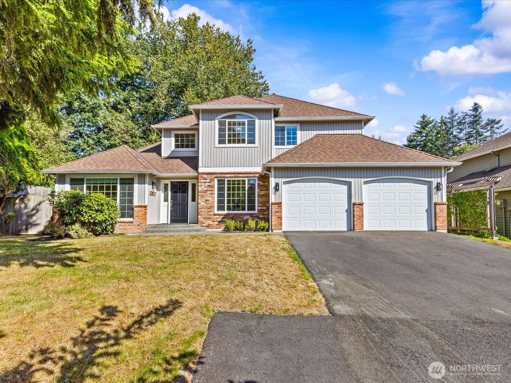 Photo of 12017 93rd Place NE, Kirkland, WA 98034 (MLS # 2582006)