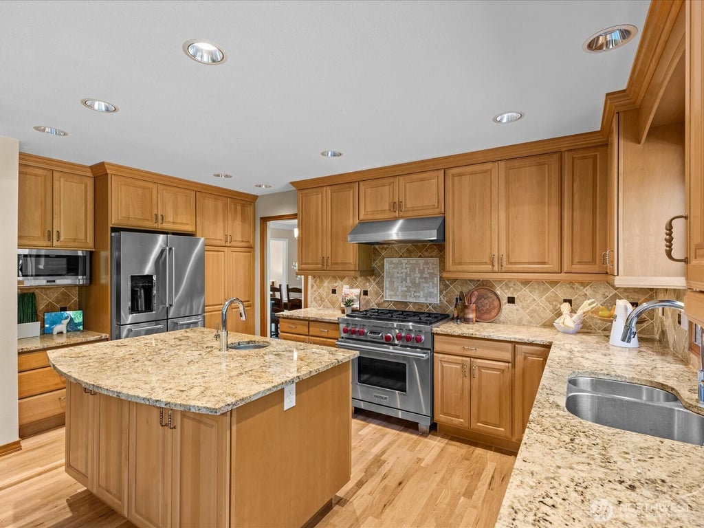 Photo of 12017 93rd Place NE, Kirkland, WA 98034 (MLS # 2582006)