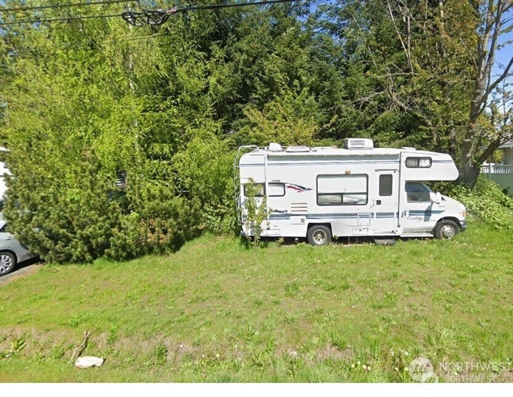 Photo of 12250 Densmore Avenue N, Seattle, WA 98133 (MLS # 2427532)