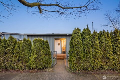 Photo of 9452 25th Avenue SW, Seattle, WA 98106 (MLS # 2492394)
