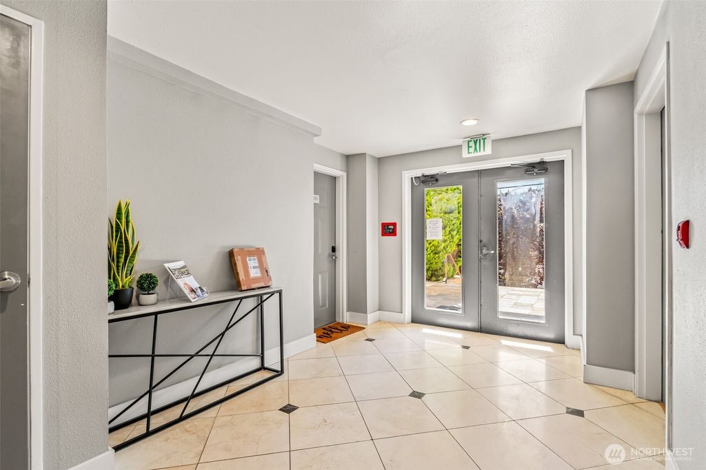 Photo of 6960 California Avenue SW #A106, Seattle, WA 98126 (MLS # 2464061)