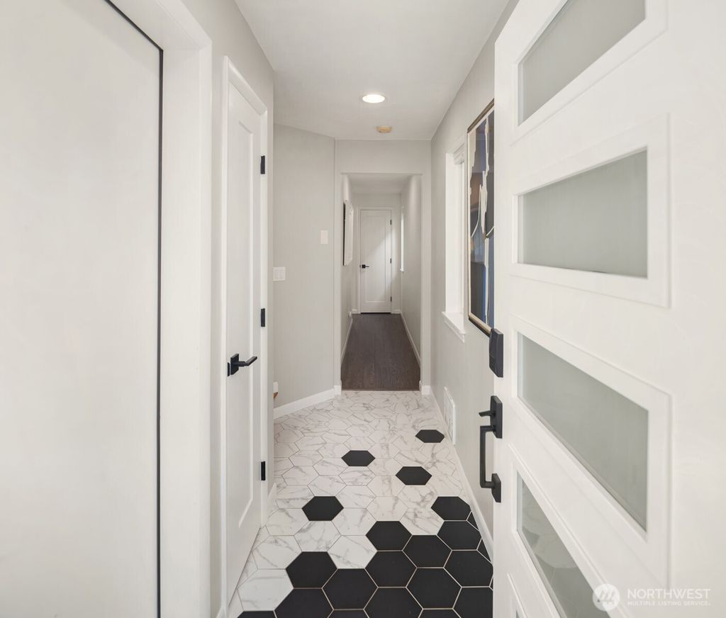 Photo of 7502 16th Avenue NW, Seattle, WA 98117 (MLS # 2445353)