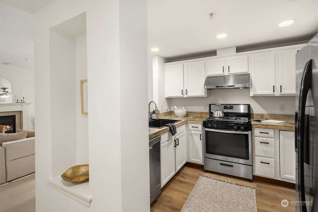 Photo of 3112 SW Avalon Way #103, Seattle, WA 98126 (MLS # 2221840)