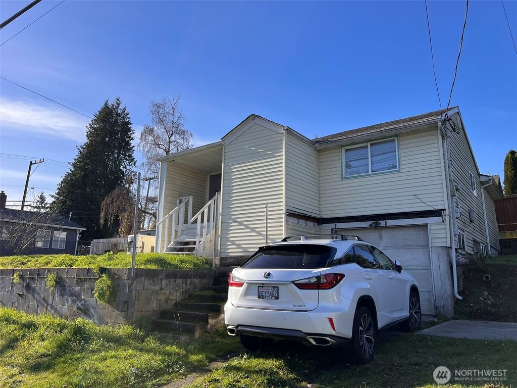 Photo of 10049 8th Avenue SW, Seattle, WA 98146 (MLS # 2458728)