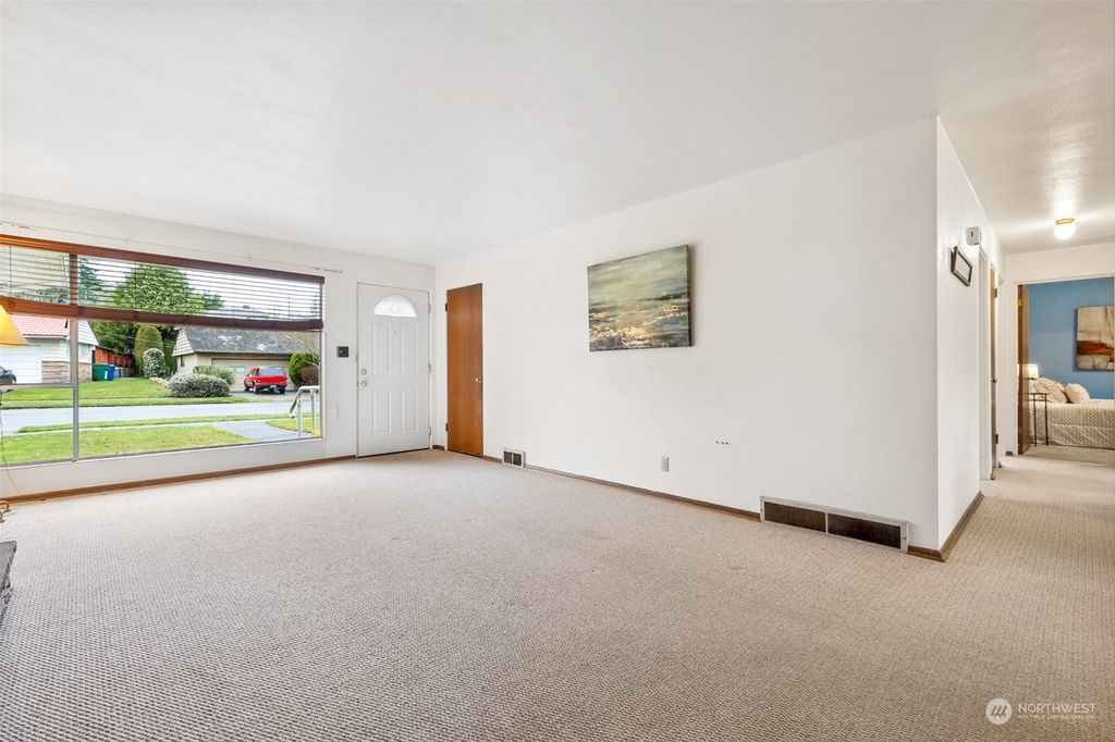 Photo of 10618 9 Avenue NW, Seattle, WA 98177 (MLS # 2193747)